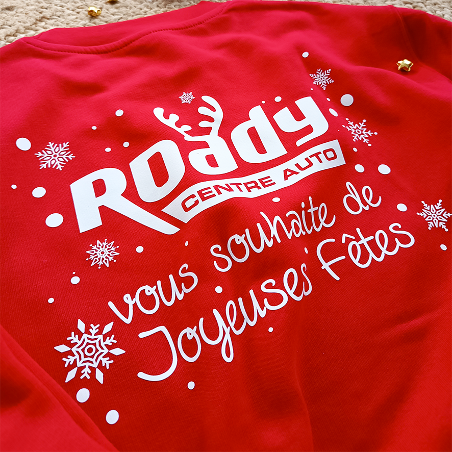 Flocage textile à l'occasion des fêtes de fin d'année sur sweat pour une entreprise sur Alès dans le Gard